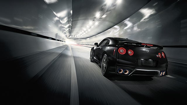 2023 Nissan GT-R seen from behind driving through a tunnel | Monken Nissan in Centralia IL
